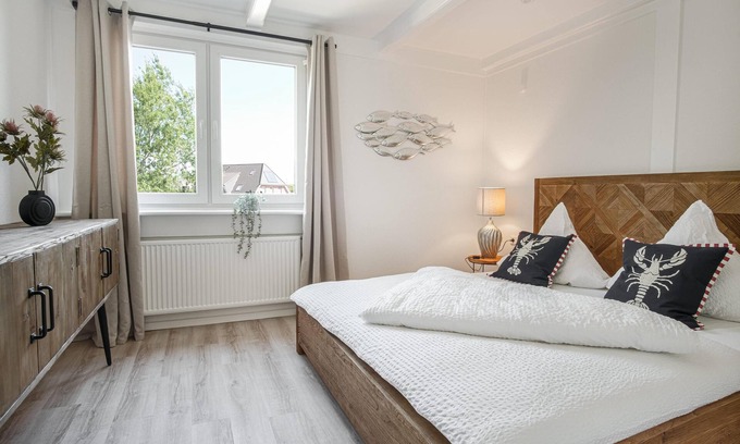 Ostersiel Apartment | Vacation apartment 'Schweinswal' with balcony for a relaxing break