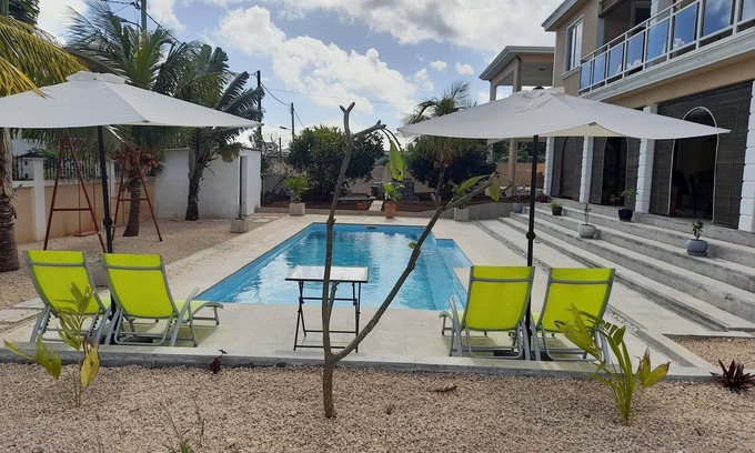 Trou aux Biches Apartment | VANILLA" ACCOMMODATION WITH SWIMMING POOL