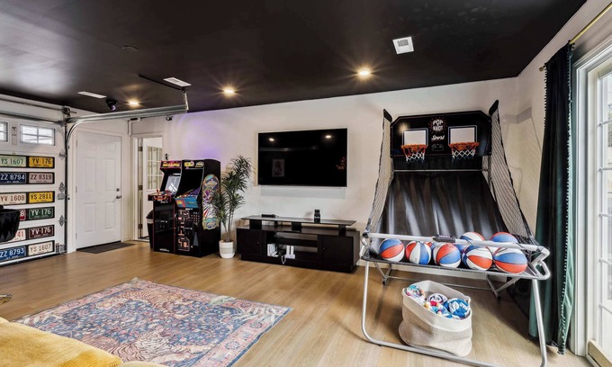 Vermilion House | Vermilion Getaway - Hot Tub Game Room Patio