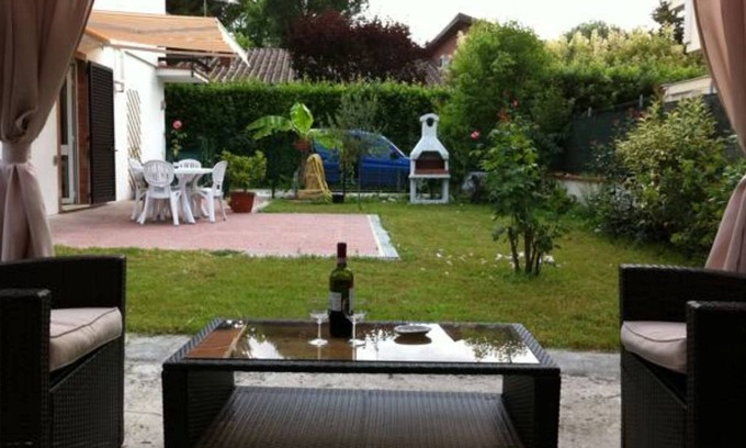 Marina di Massa Apartment | Very popular with private garden & gazebo ! Attractive ground floor apartment in 4-part villa, recen
