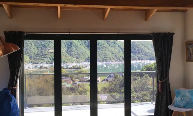 Waikawa Bay House | Views over Waikawa Marina & situated next to native bush