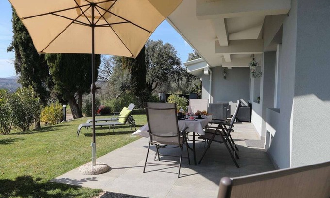 Puegnago del Garda Apartment | Villa Clara Peler with Mountain View, Shared Garden & Wi-Fi