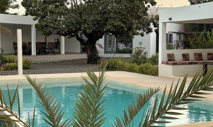 Saly Petite Cote Villa | Villa Maddy sleeps 18 in a private residence. 5 suites in independent bungalows.