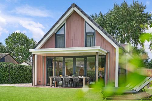Ouddorp Villa | Villa Mastlo 2x 10 persons Ouddorp large garden, 1500 meters to the dunes and beach with 2 jacuzzi's - not for companies