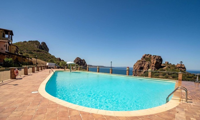 Nebida House | Villa 'Perla E Conchiglie Tancapiras' with Shared Pool, Wi-Fi and Air Conditioning