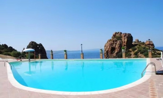 Nebida Villa | Villa Red Coral: sleeps 4, shared swimming pool, parking,