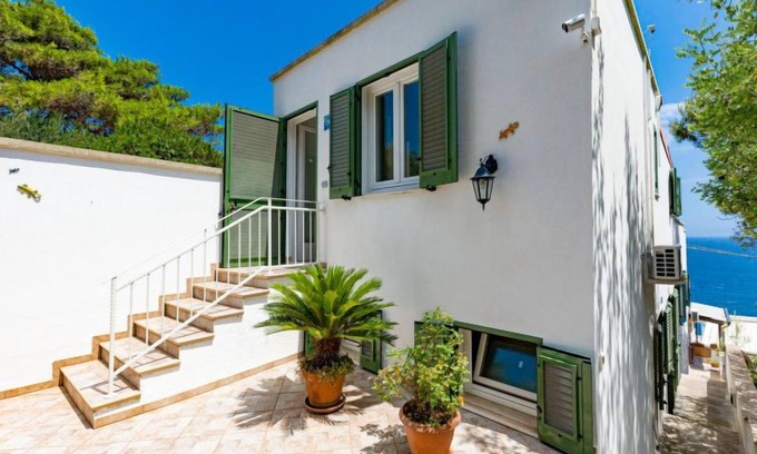 Castro Marina Apartment | Villetta Paradiso by Interhome