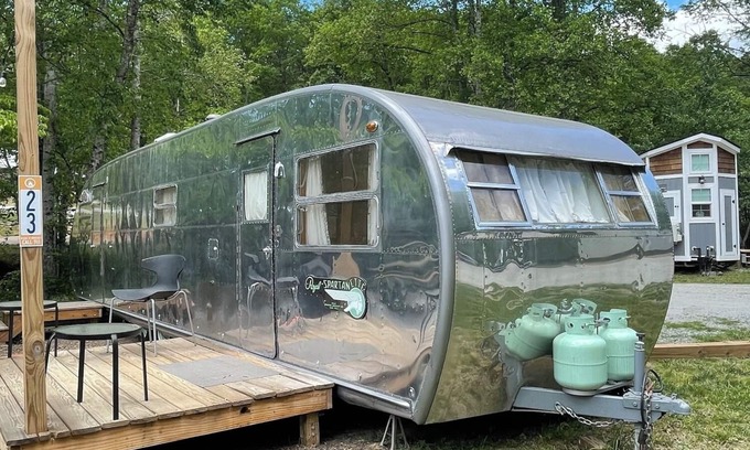Mill Spring House | Vintage camper on the creek, short walk to pool and playground, deck, gas grill, sleeps 2.