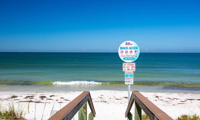 Pass-a-Grille Historic District Condo | Walk to The Best Restaurants, Beaches, and Activities. Heated Pool. Fabulous Location.