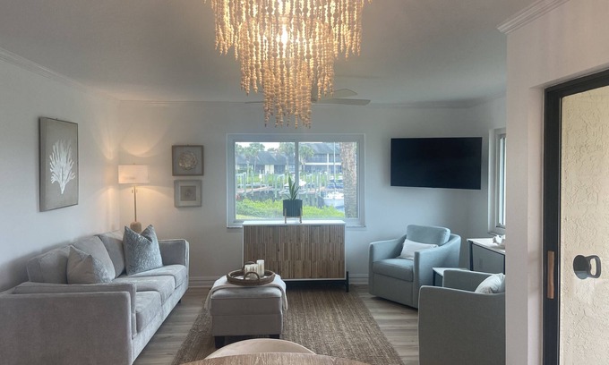 Apollo Beach Condo | Waterfront condo, gated, dock, lanai, newly remodeled, single story.