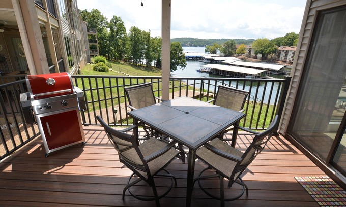 Lake Ozark Condo | Waterfront Condo with Walk-Out to Pool & Lake! Beautiful Inside! Electric Grill!