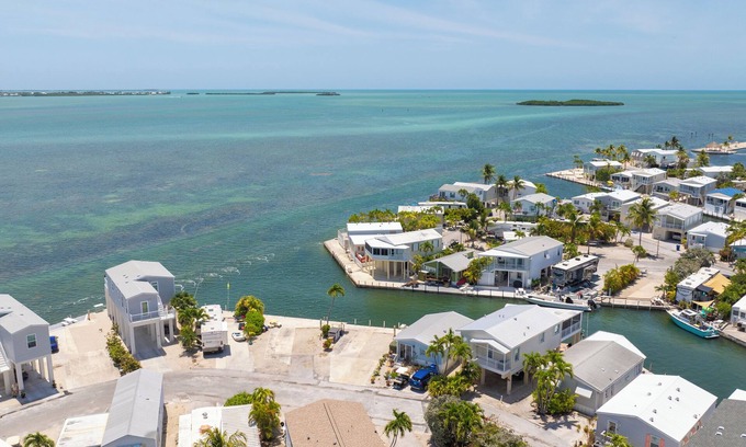 Cudjoe Key RV Rental | Waterfront RV Lot Just 2 Spots from Open Water with 35' Seawall—Fish, Boat & Relax in Paradise!