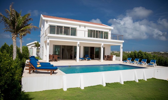 Blowing Point Villa | Waterfront villa centrally located between West End and The Valley!