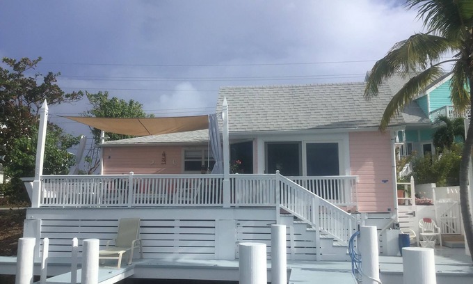 Lubbers Quarters Cay Villa | WATERFRONT VILLA with deck to enjoy the scenic views & historical lighthouse.