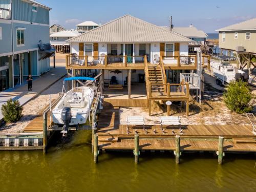 Silver Cay House | Waters Edge - PRIVATE DOCK! Only two blocks from the bay or the gulf! Plenty of parking for cars or boats home
