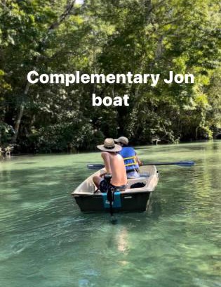 Weeki Wachee Gardens House | Weeki Wachee Retreat Canal home with hot tub kayaks canoe and boat with trolling motor included