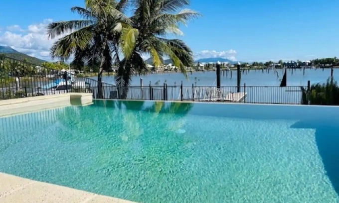 Cardwell House | Welcome to 'Hinchinbrook Escape' Waterfront Townhouse with Marina Berth Pool Spa