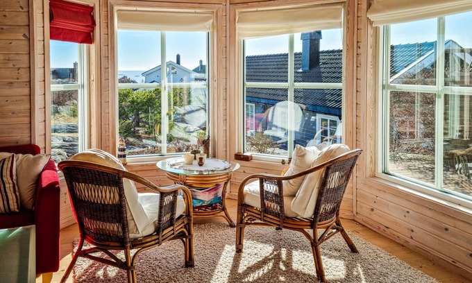 Risor House | Welcome to this inviting cottage by the sea.