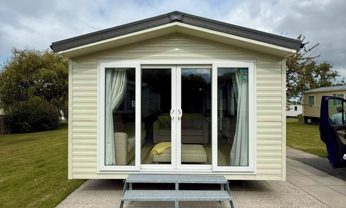 Cross Inn House | Welcoming family caravan on large pitch near beautiful New Quay in West Wales
