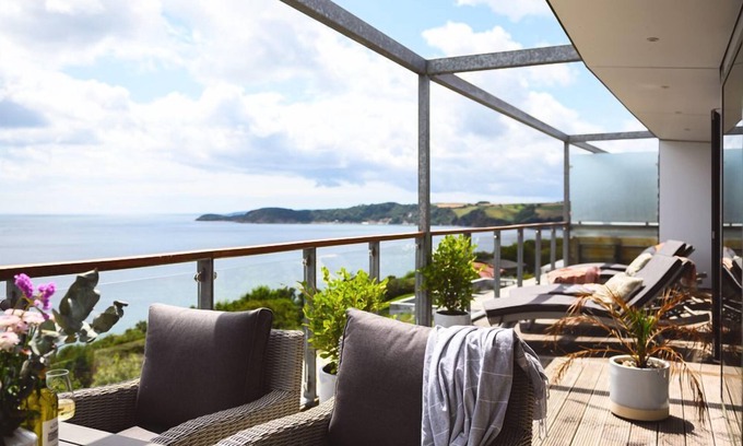 Carlyon Bay Apartment | White Sails is two bedroomed seafront penthouse apartment overlooking the water