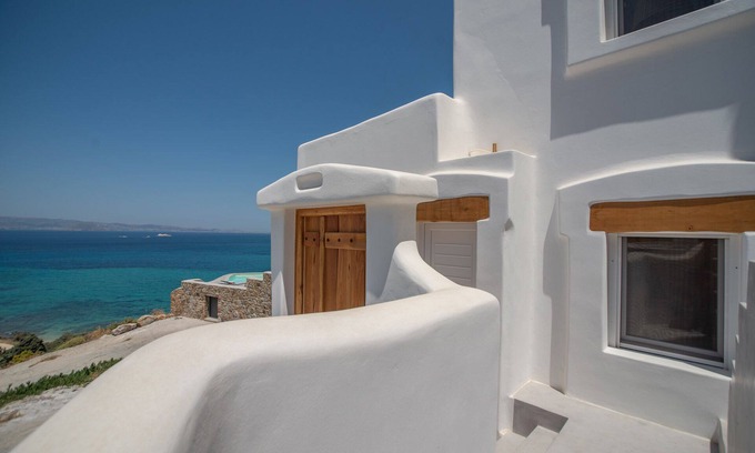 Maragas Villa | White Stone Art Villa, luxury seaside ORKOS Plaka, sublime panorama