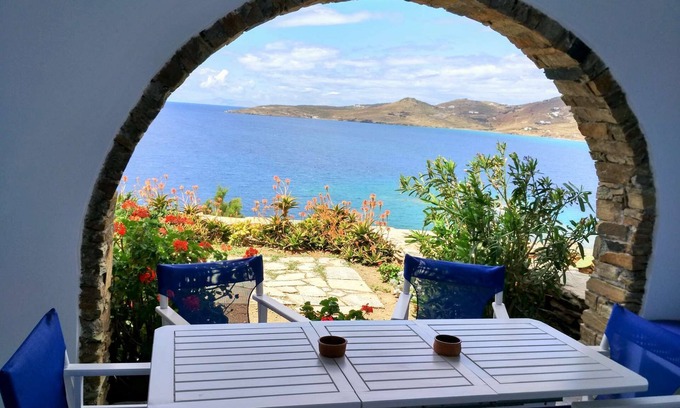 Tinos House | Windmill and houses by the sea // Stavros Bay