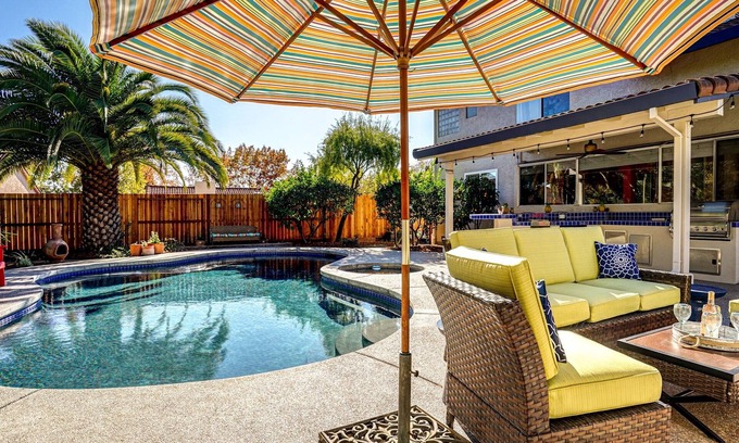 Windsor House | Wine Country Retreat. Large backyard with pool/spa, outdoor kitchen & fireplace