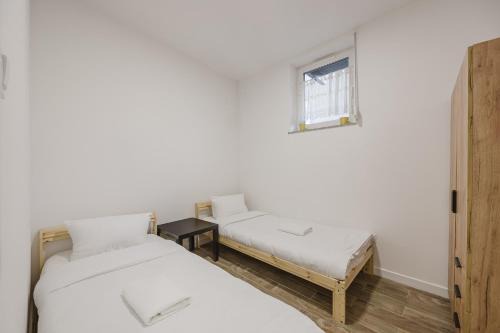 Stare Miasto District Apartment | Winogrady Nature Escape Apartment by BookingHost