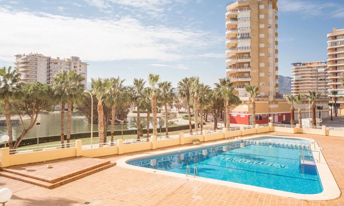 Tavernes de la Valldigna Apartment | With a great sea view from the terrace awaits you this spacious apartment near the beach of Tavernes