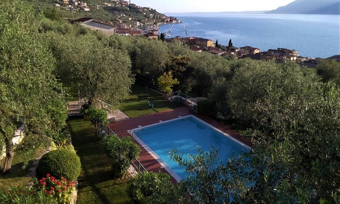 Assenza Apartment | Wonderful lake view with private garden and pool among olive trees