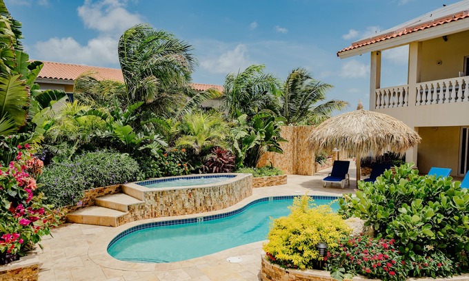 Bubali Apartment | Wonderful modern 2-bedroom apartment with tropical garden, pool and whirlpool