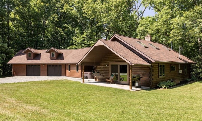 Champion House | Wooded cabin in the Laurel Highlands with beautiful yard and native trout stream