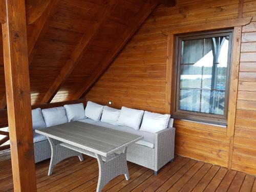 gmina Osiek House | Wooden Holiday Home in Skrzynia with Terrace
