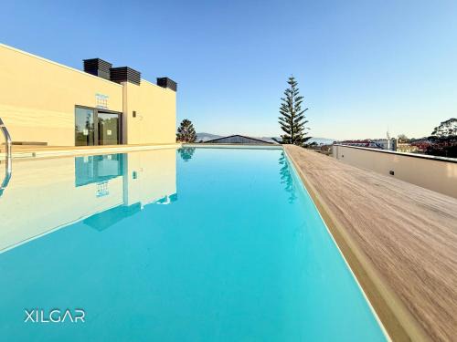 Sanxenxo Apartment | XILGAR Apto Rocafort en la playa, con piscina