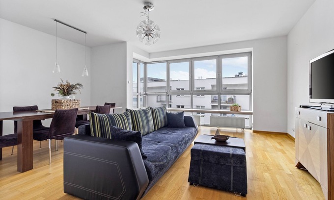 Wola Apartment | Zawiszy Apartment by Esteum Host