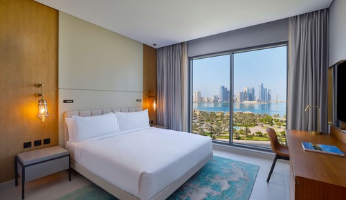 Premium Room, 1 King Bed, Waterfront View with Balcony