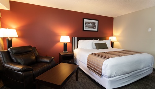 Deluxe Single Room, 1 King Bed, Refrigerator & Microwave