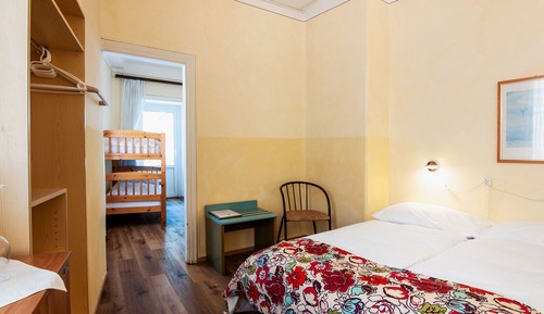 Economy six-bed room with shared bathroom