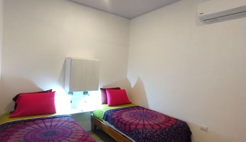 Comfort Room with 2 Single Beds Ensuite A/C