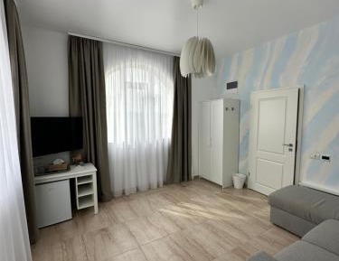One-Bedroom Apartment with Balcony and Sea View