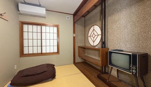Single Room with Shared Shower and Toilet