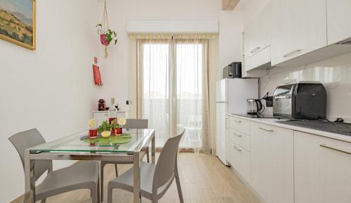 One-Bedroom Apartment with Balcony and City View