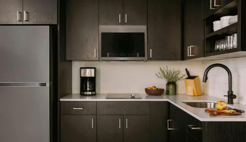 One-Bedroom Apartment with Queen and Sofa Bed and Balcony - Mobility Accessible with Roll-in Shower
