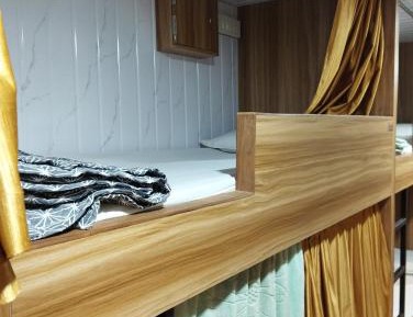 Single Bed in Male Dormitory Room with Shared Bathroom
