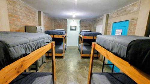Bed in 8-Bed Dormitory Room with  Two Private Bathroom