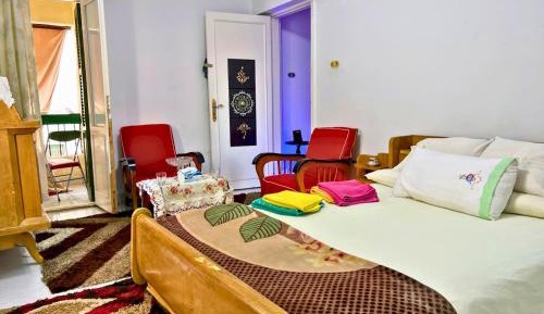 Queen Room with Shared Bathroom