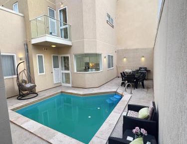 Four-Bedroom Apartment with Balcony 