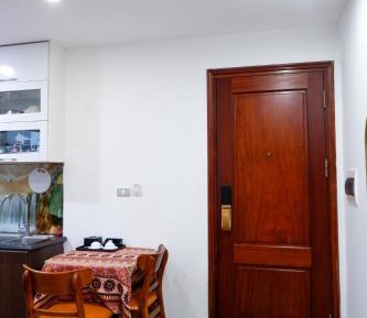 One-Bedroom Apartment with Balcony and City View