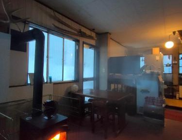 Japanese-Style Family Room with Shared Bathroom