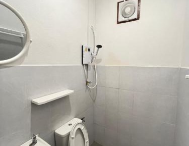 Single Bed in Dormitory Room